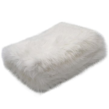 The Heritage Dog Blanket in Fur folded | Photo by Mir Martz